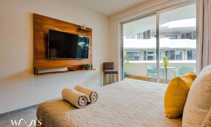 12th Street Condo | Pool View 1 Br. Steps Away from the Beach