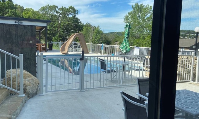 Indian Point Villa | Poolside King Villa-Hot Tub-Waterfalls-Game Room! Steps to Lake & 2 min. to SDC!