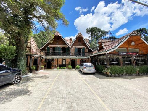 Vila Everest Hotel | Pousada do Sino