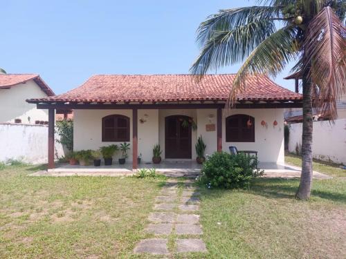 Itauna House | pousada sol das amendoeiras