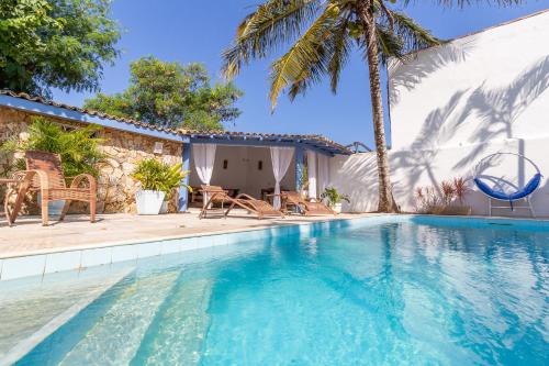 Manguinhos Hotel | Pousada Vila Capri
