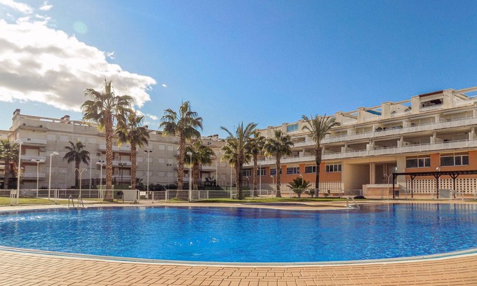 Playa de Almarda Apartment | Practical apartment on the 5th floor of an apartment complex near the sea.