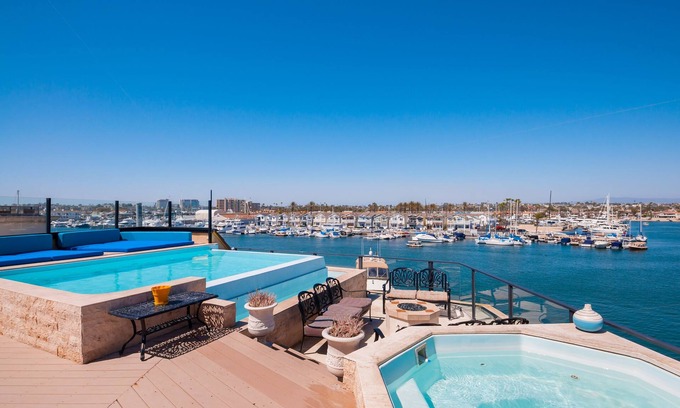 West Newport Villa | Premier Bay Front & Beach Front Home with Amazing Views