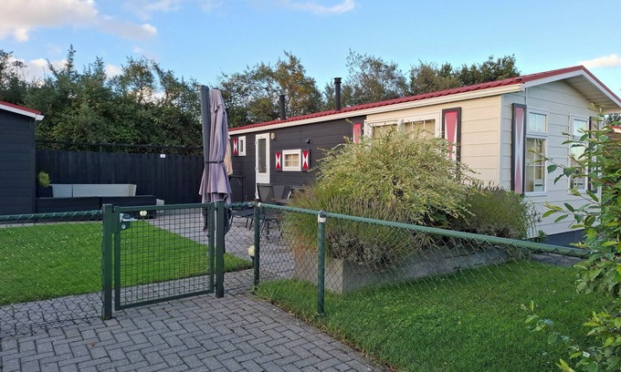 Serooskerke Ski Chalet | Pretty chalet with free WiFi on a friendly camping site