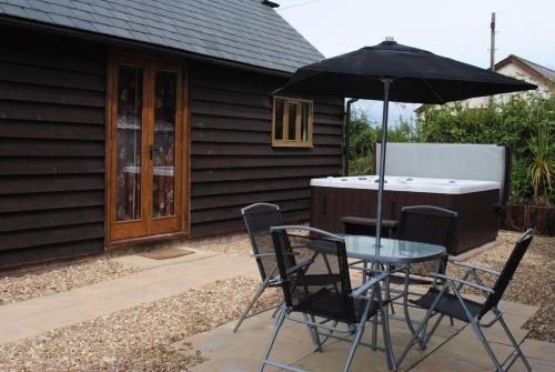 Sticklepath House | Pretty Country Cottage with Hot Tub