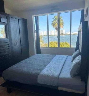 Zona Hotelera Apartment | Prime Lagoonfront Apt in Hotel Zone - Walk to Beaches & Nightlife