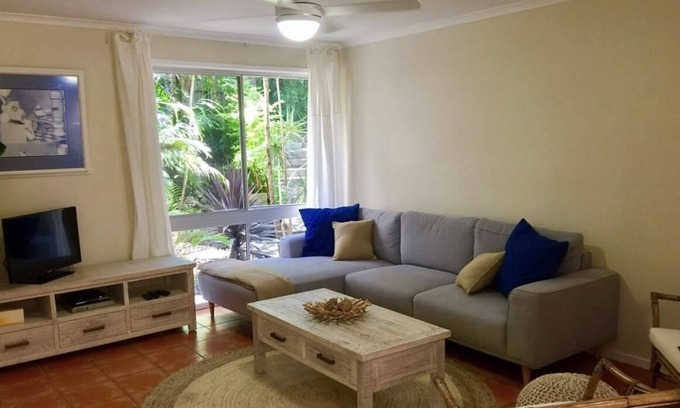 Currumbin Waters House | Private Coastal Retreat: lush tropical gardens, private resort pool w waterfall