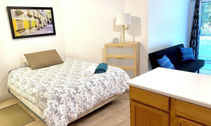 West Vancouver House | Private guest room with separate washroom and entrance