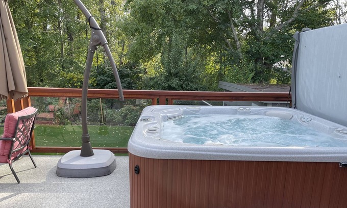 Duncan House | Private Hot tub on beautiful deck facing the gardens and tree's.