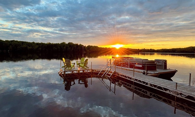 Presque Isle Cabin | Private Lakefront with Beautiful Sunsets, Kayaks, Large Decks, FirePit, & Wi-Fi