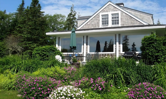 Martinsville Cottage | Private oceanfront view just steps from the rocks! Family-owned, dog-friendly.
