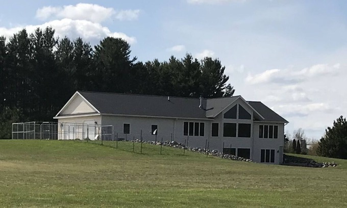 Harrison House | Private, secluded. Located at the Gateway to the North in Harrison, Michigan.
