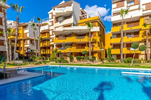 Punta Prima Apartment | Punta Prima - Charming Spanish Apartment with South-Facing Terrace by the Sea