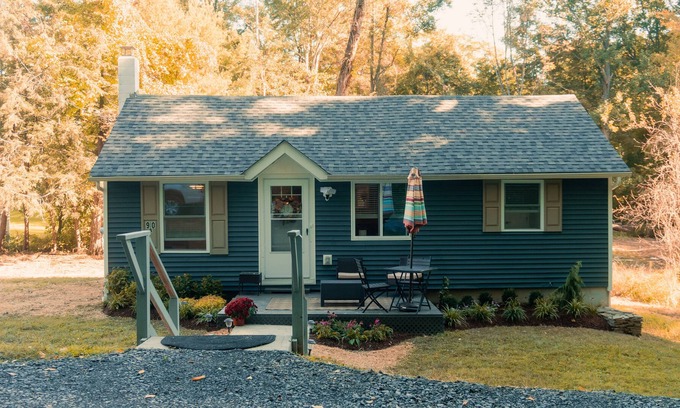 Bloomingburg Cottage | Quaint and Cozy Couples Getaway. Cottage set in a woody area.