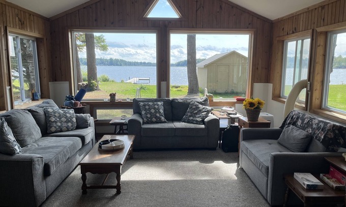 Kalkaska Cottage | Quaint Family lake cottage w/beach, dock,internet on all sports Crawford Lake
