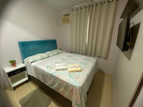 Zona Industrial Norte Apartment | Quarto aconchegante com banheiro