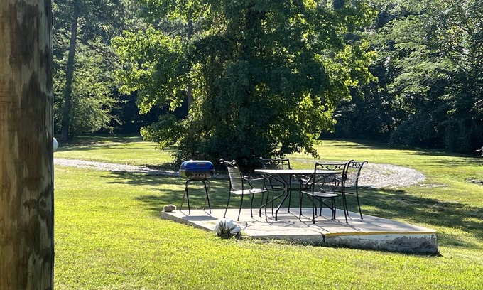 Mount Ida Apartment | Queen Guest Room located at the Joplin Inn at the entrance to Mountain Harbor, just 2 1/2 miles from Lake Ouachita. by RedAwning
