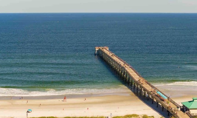 Neptune Beach Apartment | Quiet beach oasis, walk to the beach!