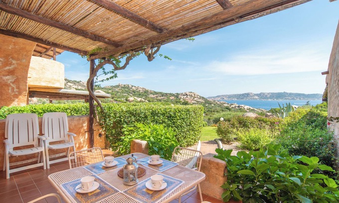 Punta Sardegna Apartment | Quiet Holiday Apartment with Terrace with Sea View; Parking Available; Pets Allowed