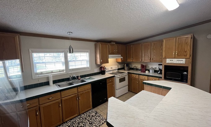 King House | Quiet., Large home on 2 acre estate that can host large groups close to town.