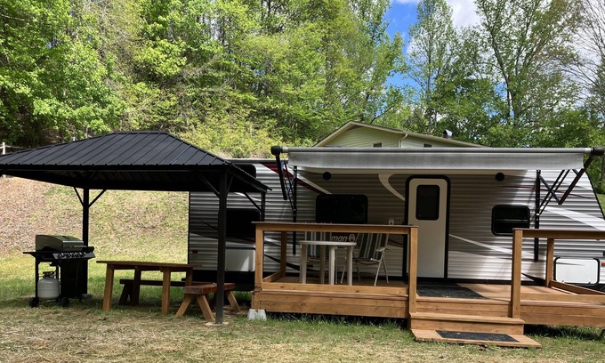 Brevard House | Rader Retreat RV/Camper cozy spot to sit out on the deck after a day of hiking.