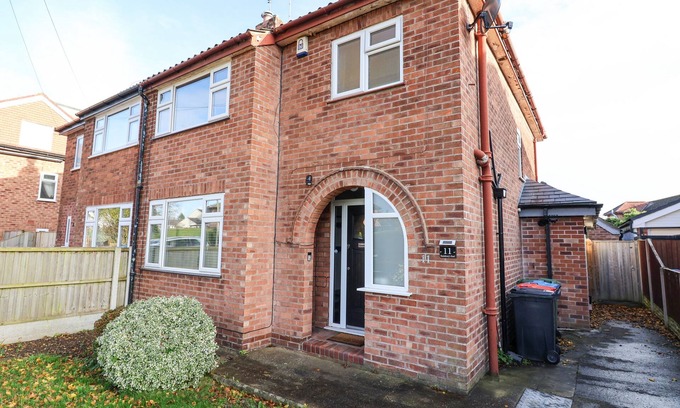 Rowton House | RAINBOWS END, with a garden in Christleton
