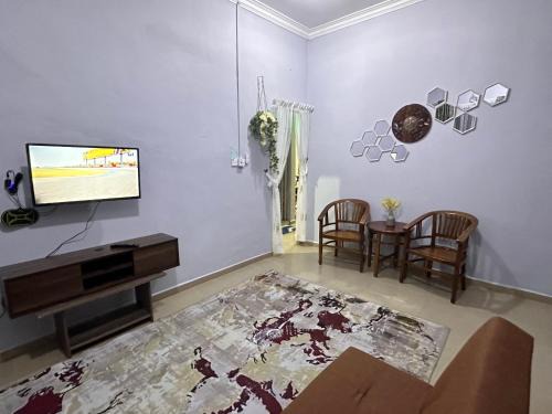 Kampung Rambutan Rendang Ski Chalet | Raudah Homestay
