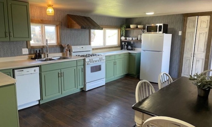 Philipsburg House | Recently remodeled family home with large fenced in back yard, Full size kitchen, 2 full bathrooms, Bedroom 1 has a king size bed, Bedroom 2 has a queen size bed. The flex space has a trundle bed with 2 twins.