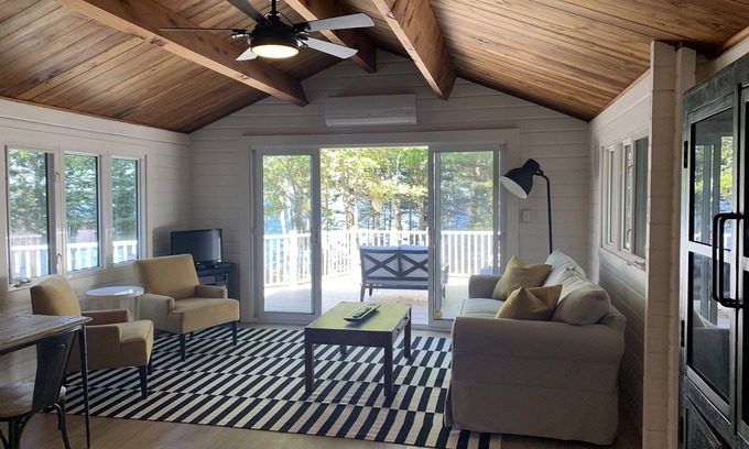 Bayview Cottage | "Redcliff" - Waterfront Chalet style Cedar Log Cottage in Cavendish Resort Area