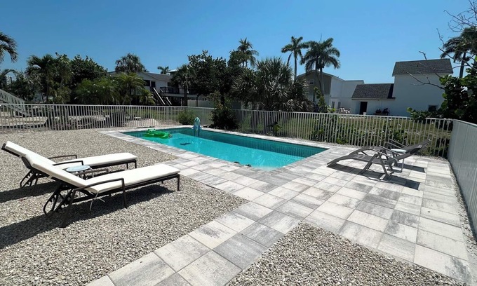Laguna Shores House | Redfish Retreat - South End Pool Home