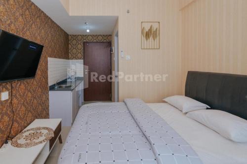 Bekasi Hotel | RedLiving Apartemen Sayana - Family Group Property Tower Cha