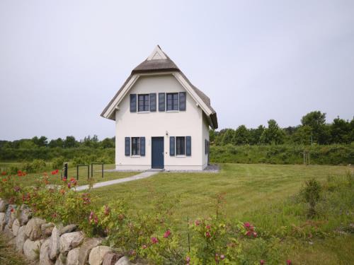 Kreptitz House | Reetland am Meer - Premium Reetdachvilla mit 3 Schlafzimmern, Sauna und Kamin F04