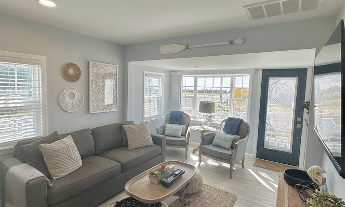 Villas Cottage | Relax here with beach views, steps to the beach, fenced in yard, pet friendly