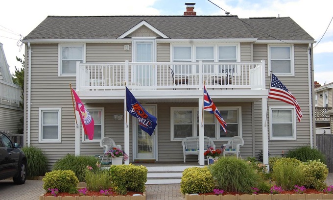 North Beach Haven House | Relax on the deck of this 2nd floor oceanside duplex just steps from the beach.