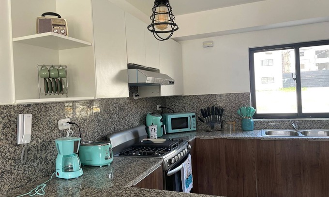 Puerto Plata Apartment | Relax with the whole family at this peaceful condo, In the meddle of everything