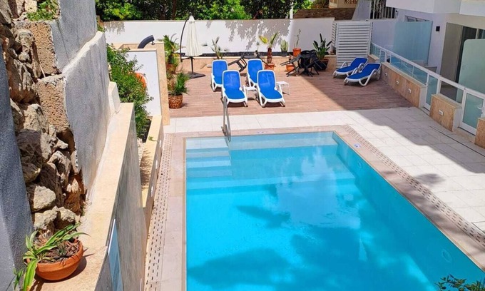 Mellieħa Heights Apartment | Relax with the whole family at this peaceful place to stay