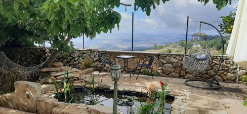 Safed Apartment | Relaxed garden apartment with Galilee sea view 1