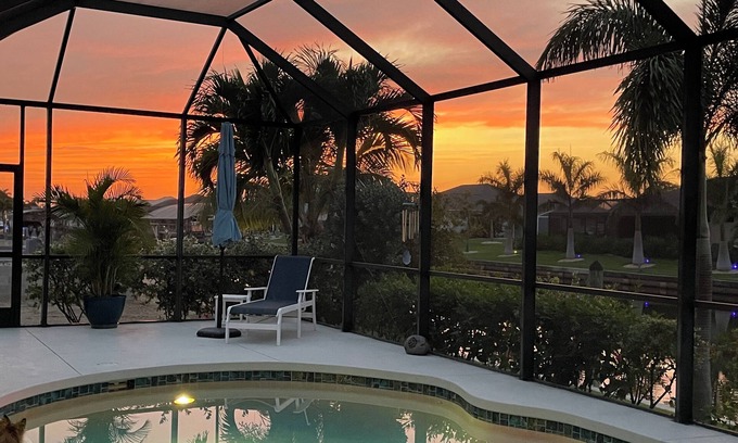 South Gulf Cove House | Relaxing 3 Bedroom - On the canal, private pool, boat dock & access to the gulf.