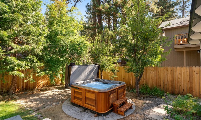 Tahoe Island House | Relaxing dog-friendly home with fireplace, hot tub, patio, game room, & W/D