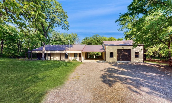 Kingston House | Relaxing escape on a large lot with a washer/dryer, sunroom, & firepit