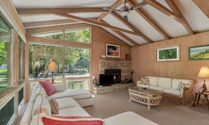 Frankfort Cottage | Remodeled cottage with a modern kitchen, fireplace, kayaks, & paddle boards