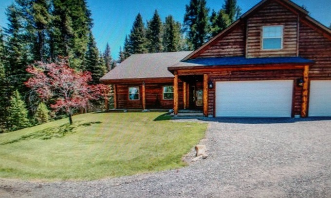 Tamarack Resort Cabin | REMOTE CABIN WITH HOT TUB, MOVIE THEATER AND HUGE COVERED DECK WITH FIRE TABLE