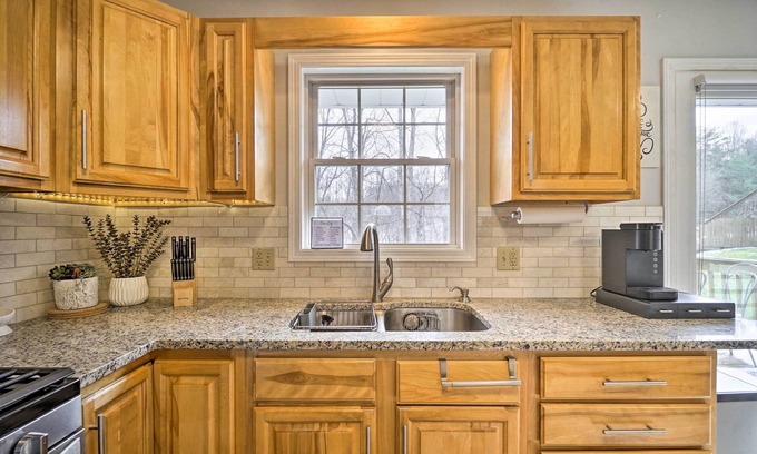 Logan Cottage | Renovated Logan Home w/Pond & Fire Pit