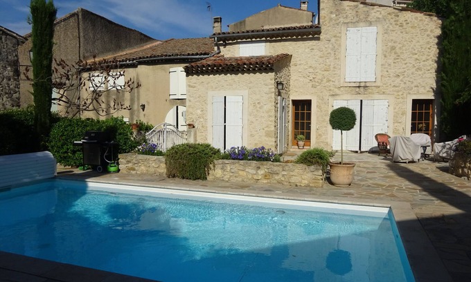 La Bastidonne House | Renovated stone house with private walled garden, heated pool, in quiet village.