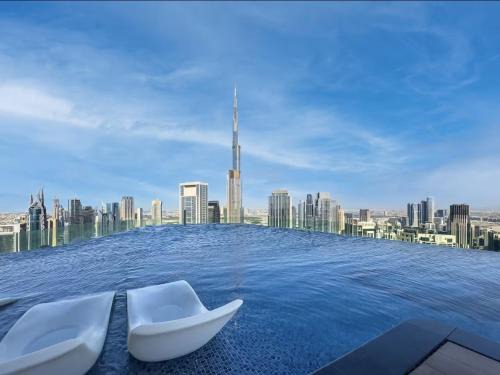 Trade Centre 1 Apartment | Restay Homes at Paramount Midtown Hotel - Highest infinity pool access with Burj View