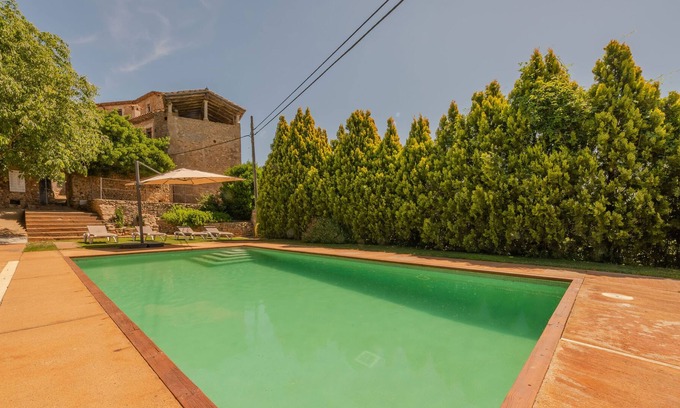Sant Esteve de Guialbes House | Restored farmhouse with large garden, pool and large covered terrace
