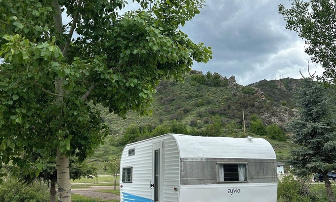 Lava Hot Springs House | Retro Camper king size bed