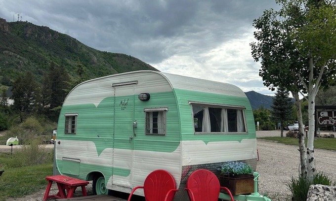 Lava Hot Springs Apartment | Retro Camper Queen size bed