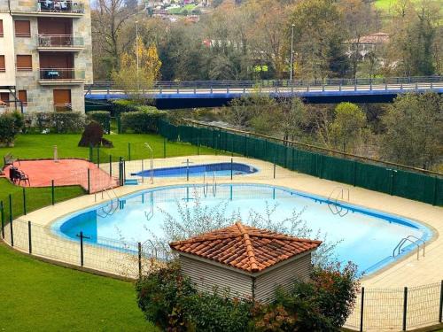 Cangas de Onis Apartment | Rincón con piscina en Picos de Europa