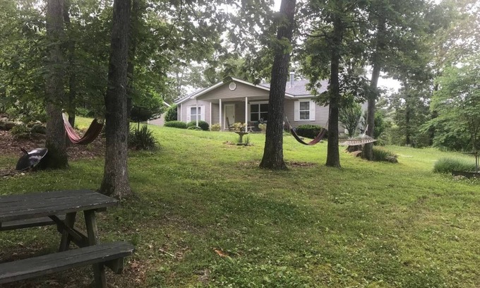 Fredericktown Cabin | River front property HOT TUB, Kayak, tubing, and fishing